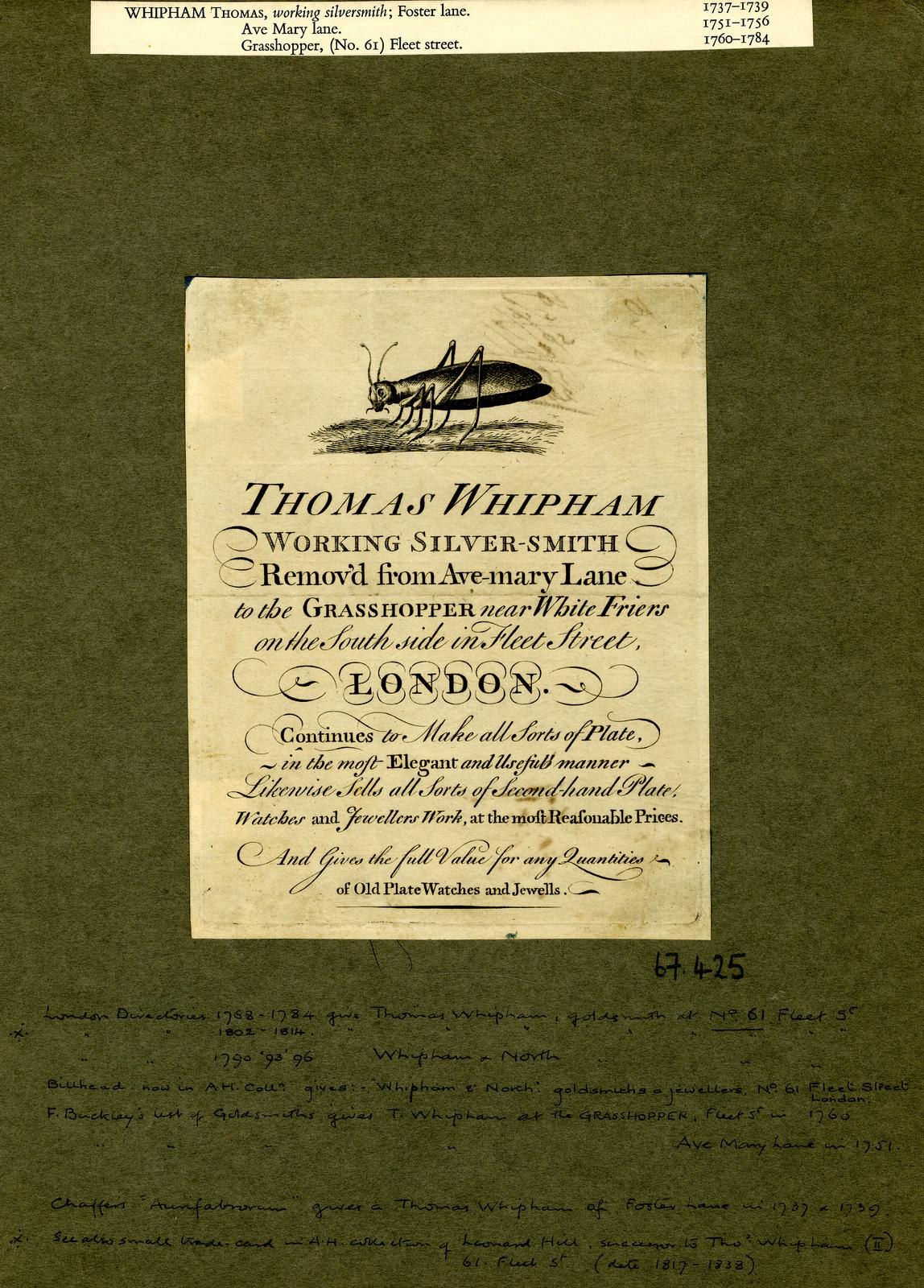 Ein altes Buch mit einer Zeichnung einer Heuschrecke auf dem Cover, das Text auf dem Papier enthält.