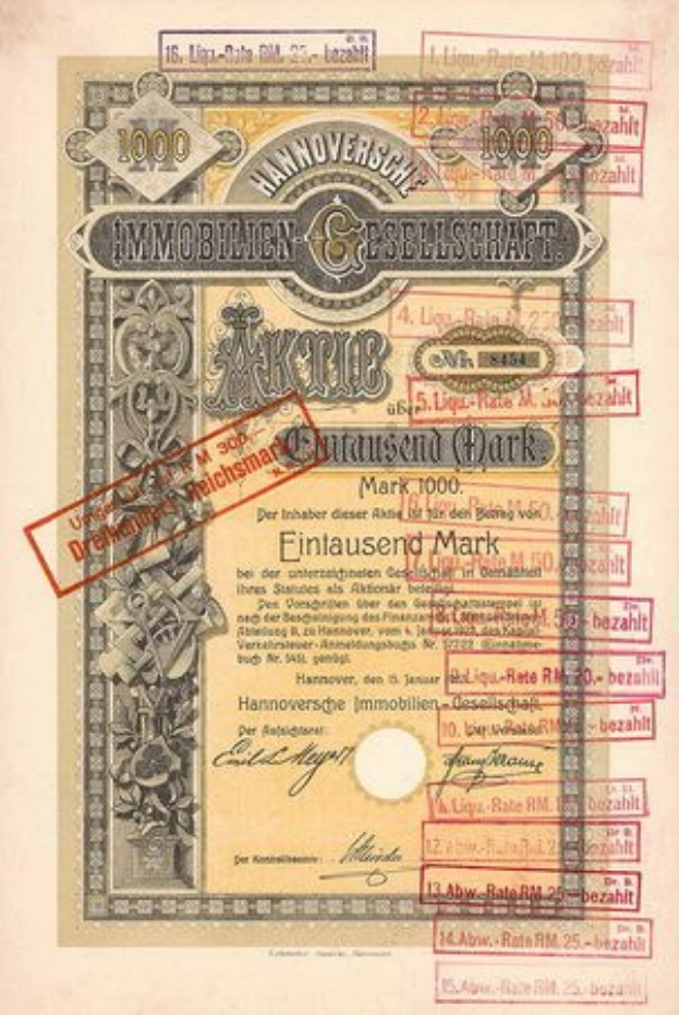 Alte deutsche Regierungsanleihe mit rotem Stempel, Text und Zahlen auf altem Papier.