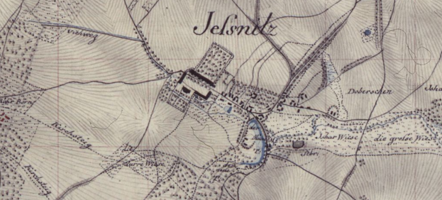 Ein detailliertes altes Stadtplan von Jelsnitz, Deutschland, zentriert auf einem Geb├Ąude mit umgebender Text, zeigt Stra├čen, Geb├Ąude und andere Gebietmerkmale.